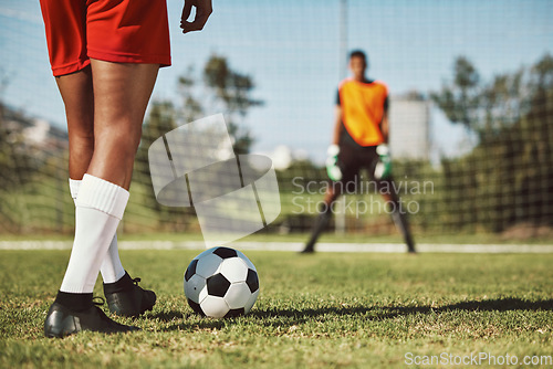 Image of Sports, soccer field and legs of athlete with goalkeeper ready for penalty kick, game or competition for fitness health. Football player, ball or man prepare for outdoor workout, training or exercise