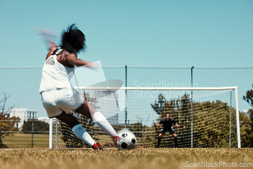 Image of Woman, score and net for goal in soccer, training and sports on field for fitness, health and exercise. Girl, football and kick, aim and workout on grass for sport in summer, sunshine and game