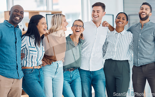 Image of Teamwork, friends and funny with business people laughing together in their office at work. Collaboration, happy and success with a man and woman employee group joking while working as a team