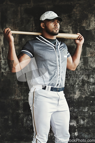 Image of Man, baseball and bat while thinking, focus and determination in match, game or sport. Baseball player, serious and contemplating in sports, tournament or competition for championship