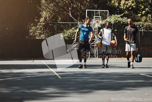 Image of Diversity, friends and sports on basketball court, training fitness exercise in New York and happy team talking. Healthy lifestyle club, group walking together and motivation for fun competition game