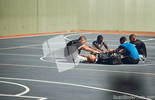 Image of Basketball, team and stretching on sports court to warm up for training, cardio exercise and workout outdoors in Atlanta. Fitness, teamwork and healthy athletes ready to start exercising or practice