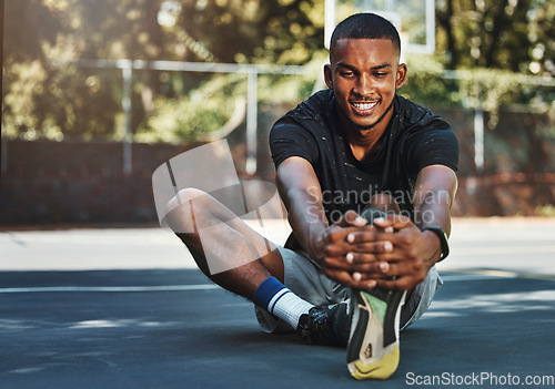 Image of Black man, fitness and stretching leg in city, street or urban outdoors. Sports, health and happy male from Nigeria on ground, warm up or getting ready for running, training or workout exercise alone