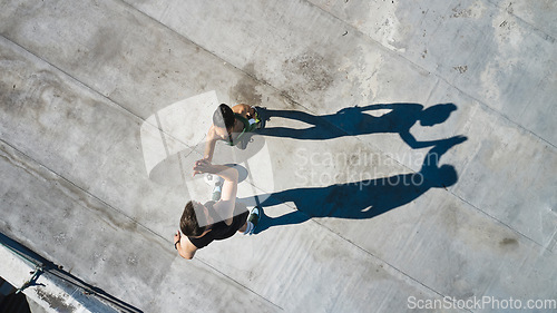 Image of High five, support and success in rooftop fitness, workout or training in Canada for health, wellness or cardio exercise. Top view, teamwork or collaboration gesture for sports friends, man and woman