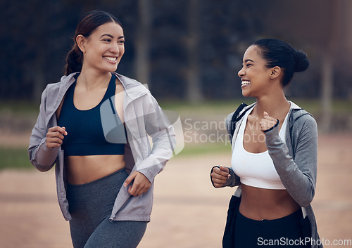 Image of Fitness, nature and friends running for an outdoor cardio workout or sports marathon training. Freedom, exercise and happy healthy women runners on a run in a park for health, wellness and motivation