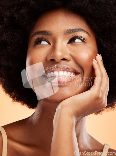 Image of Face, beauty and skincare with a black woman thinking in studio on an orange background for cosmetics and wellness. Health, skin and care with a model female posing for antiaging treatment or product