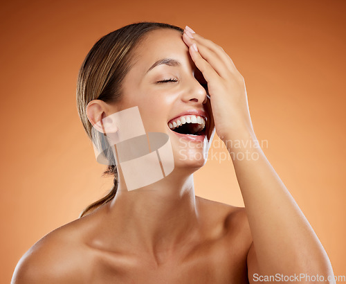 Image of Skincare, beauty and wellness for skin, self care and body cosmetic of a happy, smile and healthy woman laugh in studio. Portrait of laughing, happiness and smile model with clean face and complexion