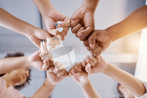 Image of Fist bump, team building and business people in a meeting with mission, our vision and growth mindset in a circle. Below, huddle and hands of employees with group goals, targets and global support