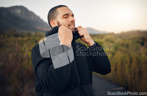 Image of Man breathing in nature, mountain forest peace and spiritual wellness meditation in Canada winter. Calm breathe of fresh air, natural outdoor freedom of faith and relax in fresh green trees in woods