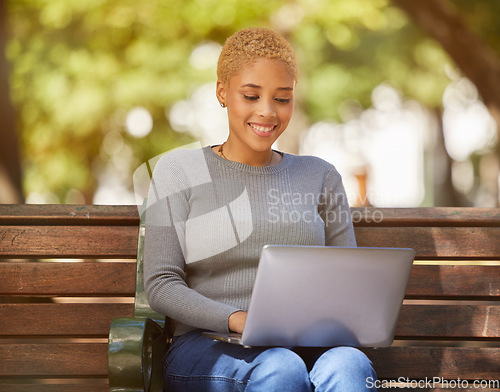 Image of Happy black woman, laptop and outdoor relax in sunshine on bench in city, online job search or remote work in park. Young girl smiling, creative writer or copyright designer on 5g zoom meeting app