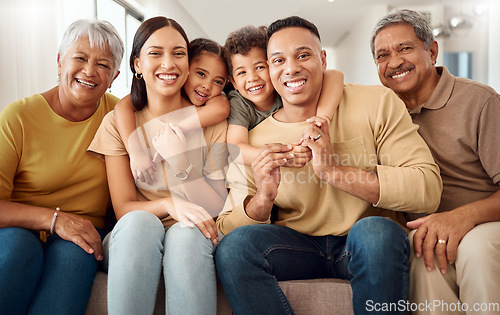 Image of House, portrait and happy big family love enjoying quality time, gathering and having fun bonding in Colombia. Mother, father and elderly grandparents relaxing on a sofa with young children siblings