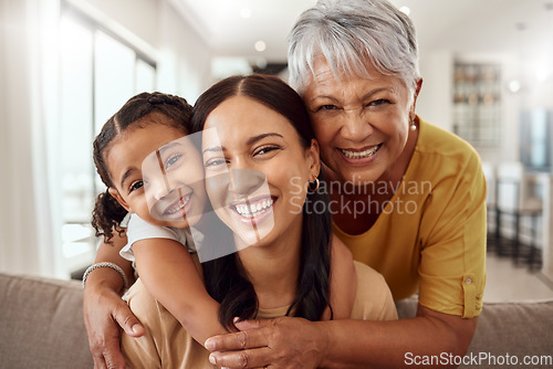 Image of Child, mother and grandmother portrait while at home on sofa with smile, love and support sharing hug for generation of senior, woman and child. Portrait of brazil girls happy on mothers day together