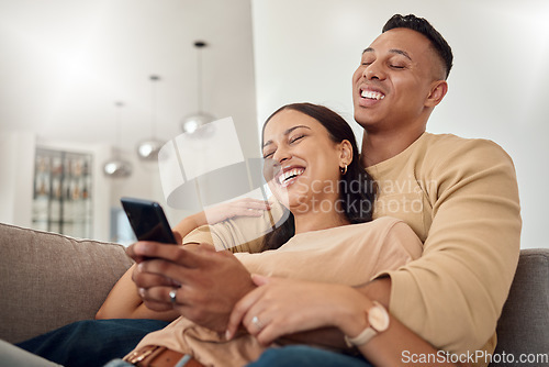 Image of Phone, happy and couple on a social media meme internet page or website online laughing at funny content. Smile, subscription and young woman loves bonding and streaming comedy with partner at home