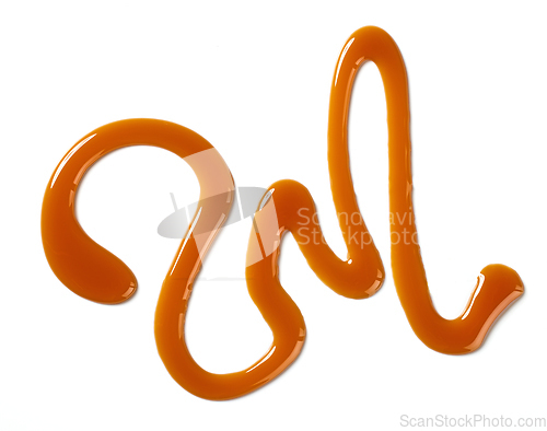 Image of caramel sauce on white background