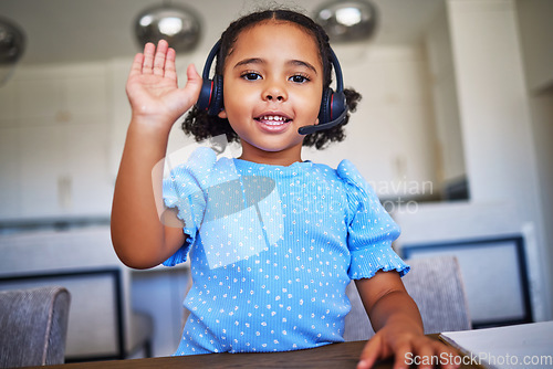 Image of Elearning, headset and girl child doing an online class waving to greet on an internet video call. Happy, communication and portrait of a kid with distance learning for education with headphones.