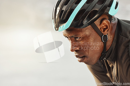 Image of Cyclist man, sweating and focus for marathon race, competition or sports event on sky mock up for advertising space or marketing. Cycling sports person in helmet tired for training fitness challenge