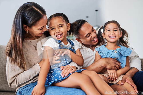 Image of Love, family and happy kids relax and play with parents on sofa, laughing, cheerful and having fun. Happy family, girls and loving mother and father enjoy quality time with smiling children at home