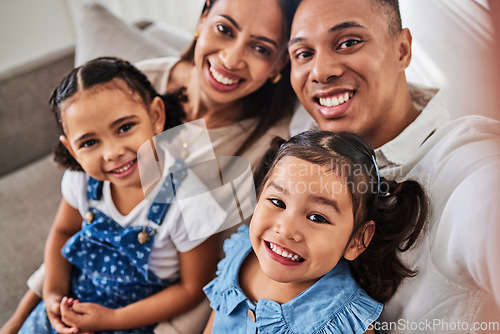 Image of Smile, selfie and portrait of a happy family that love enjoy quality time, relaxing and bonding together in a house. Mother, father and girl children siblings smiling for pictures at home in Lisbon