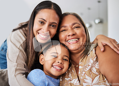 Image of Love, family and portrait of multigenerational women on a sofa, relax, happy and bonding in a living room. Portrait, mother, girl and grandma smile, hug and relaxing on a couch enjoying quality time