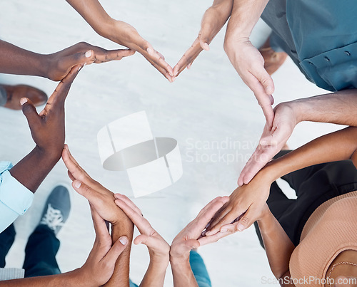 Image of Teamwork hands, heart and diversity partnership, business people support or community care, motivation and trust. Above group team building for charity, kindness and global solidarity, love and hope