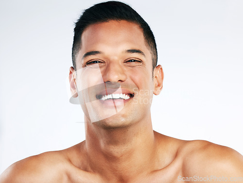 Image of Happy man, skincare and body care after dermatology, cleaning and cosmetology treatment feeling clean on white background. Portrait and face of laughing guy with healthy skin and wellness lifestyle