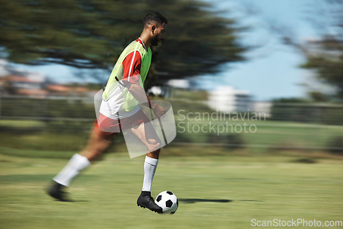 Image of Soccer, sports and man athlete in a football game on sport field running fast and kick in nature. Fitness, training and health exercise of a workout match run with a player energy and motivation