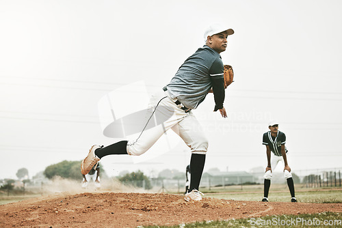 Image of Baseball, pitch and team sports of a man pitcher busy with teamwork, fitness and fast ball throw. Baseball player training, exercise and workout of a athlete group in a game on a baseball field