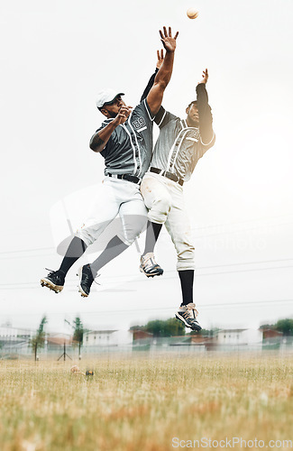 Image of Sports, baseball and men jump to catch ball on field during game, action and motion with teamwork. Fitness, baseball team and black man jumping with teammate to help with catching for strike out.