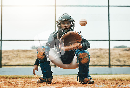 Image of Baseball, catch and sports at the pitch for game, point or score with the ball on a field in the outdoors. Black man pitcher with mitt in sport training, exercise and fitness in competitive match