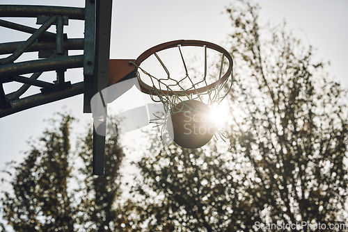 Image of Basketball court net, silhouette and sports playing game, competition and action match outdoor. Empty background winning, goal target aim and shooting hoops skills training, hobby and fun performance