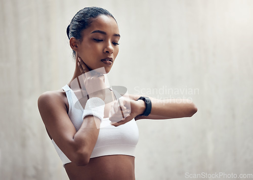 Image of Woman, fitness and heart rate neck pulse, wellness and training challenge in urban city outdoor. Young sports runner athlete check smart watch to monitor cardio, body health progress or exercise time