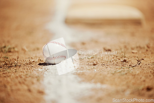 Image of Baseball, chalk line and ball on field before sports game, training and practice. Competition, motivation and sport equipment on baseball field ground. Isolated, close up and copy space for softball