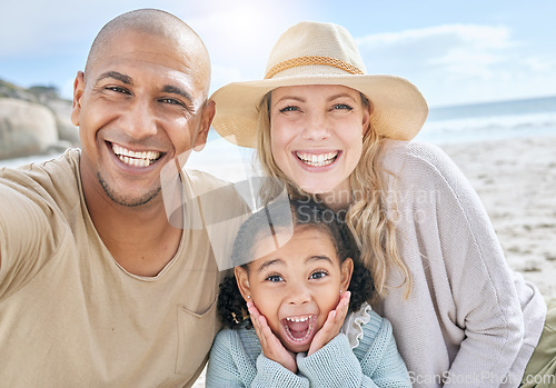 Image of Selfie, beach and portrait of a happy family on vacation together in nature by the ocean. Happy, smile and parents with their girl child taking photo while relaxing at seaside on holiday or adventure