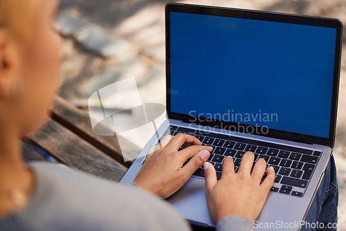 Image of Laptop, park bench and woman typing on green screen for digital marketing, advertising or product placement. Freelance work, outdoor 5g connection and writer, blogger or author in garden online.