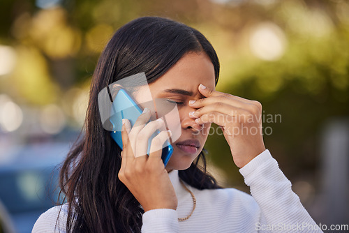 Image of Black woman, phone call and stress, worry or sad, communication and reaction to bad news, conversation on smartphone and outdoor. African American person, headache and serious, upset and concern.