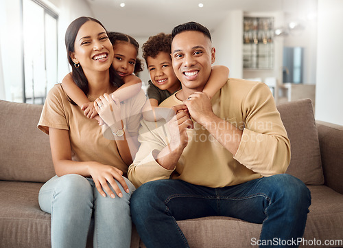 Image of Family, mother and father with hugging kids relaxing on living room sofa with smile for quality bonding time at home. Portrait of happy mama, dad and children smiling in happiness for break together