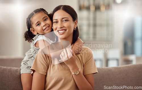 Image of Black family, hug and portrait of child with mother, mom or mama bond, relax and enjoy quality time together. Love, happy family and woman with kid girl smile, care or lounge on home living room sofa
