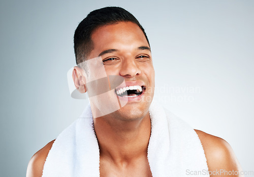 Image of Happy, laugh and face of man clean after wellness wash, facial cleaning routine and skincare mockup. Happiness, smile and person with bath shower towel for body self care isolated on gray background