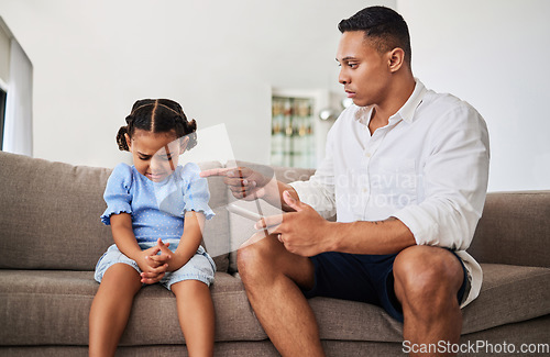 Image of Angry, father with tablet and kid conflict, upset and serious scolding, no screen time with sad child and frustrated parent pointing. Family stress, bad behavior and distress, guilt and annoyed.