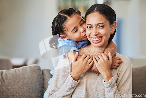 Image of Love, mother and girl hug being happy, relax and bonding enjoy on couch in living room with smile together. Mama, child and kid embrace for quality time, on sofa laugh and loving in lounge at home.