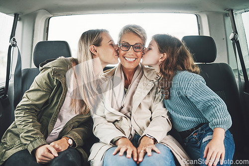 Image of Family, kiss and road trip with a girl, mother and grandmother in the backseat of a car for a drive. Love, travel and transport with a senior woman, daughter and granddaughter on vacation or holiday