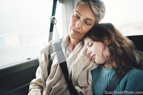 Image of Woman and girl in car sleeping during road trip, journey or drive for travel, vacation or holiday. Grandmother, child and sleep in van, vehicle or transportation for rest together as family