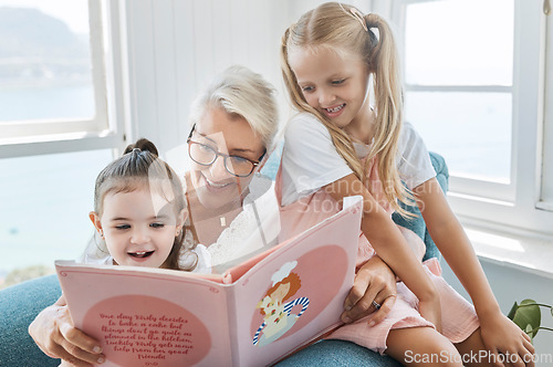 Image of Book, reading and grandmother with children for learning, language development and English education in living room sofa. Senior family, elderly woman teaching kids story for kindergarten holiday fun