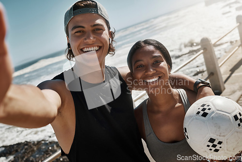 Image of Selfie, friends and soccer for exercise by beach, for training and wellness with ball, smile and happy outdoor. Workout, man and healthy woman being relax, fitness and cheerful for health or football