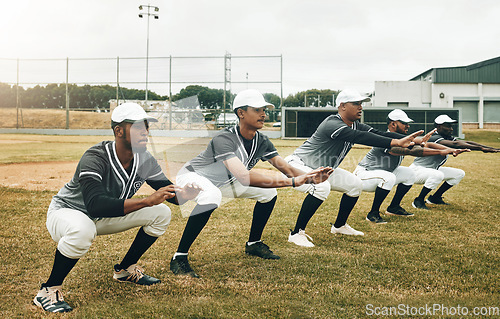 Image of Sports, baseball and team stretching in training, exercise and fitness workout on a baseball field in Houston, USA. Teamwork, softball and healthy group of men ready to start playing a match game