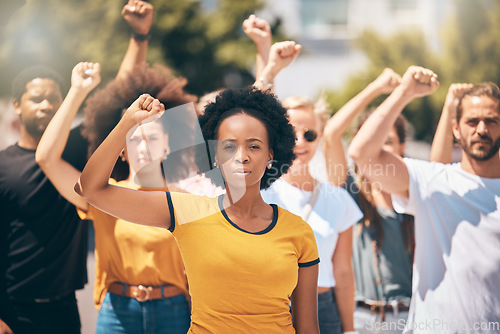 Image of Protest, group of people with hands in air in street and solidarity for womans rights, human rights and against war. Diversity, men and women in crowd together in support of unity, justice and cause.