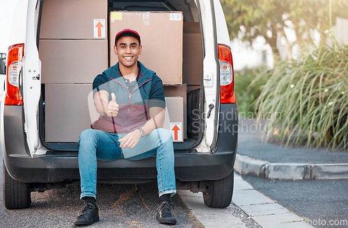 Image of Delivery, box and man in truck with thumbs up, trust and success in courier service for ecommerce business. Supply chain, cargo and logistics driver with smile in van with retail stock for transport.