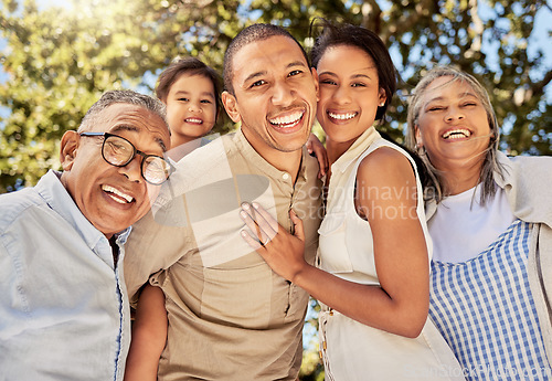 Image of Big family, portrait smile and hug in nature for quality bonding time for summer vacation in the outdoors. Mother, father and kid with grandparents smiling together in happiness for fun family trip
