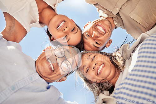 Image of Portrait, huddle and family with smile for support, love and solidarity from below with blue sky. Face of happy, relax and comic children with senior parents for community and happiness in summer