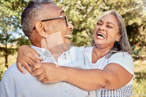 Image of Happy, love and laugh with a senior couple having fun in a garden or park together during summer. Trees, smile and retirement with an elderly man and woman pensioner bonding while enjoying nature